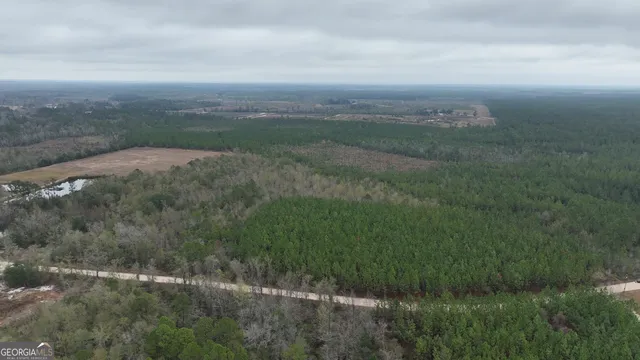 a view of lake with green space