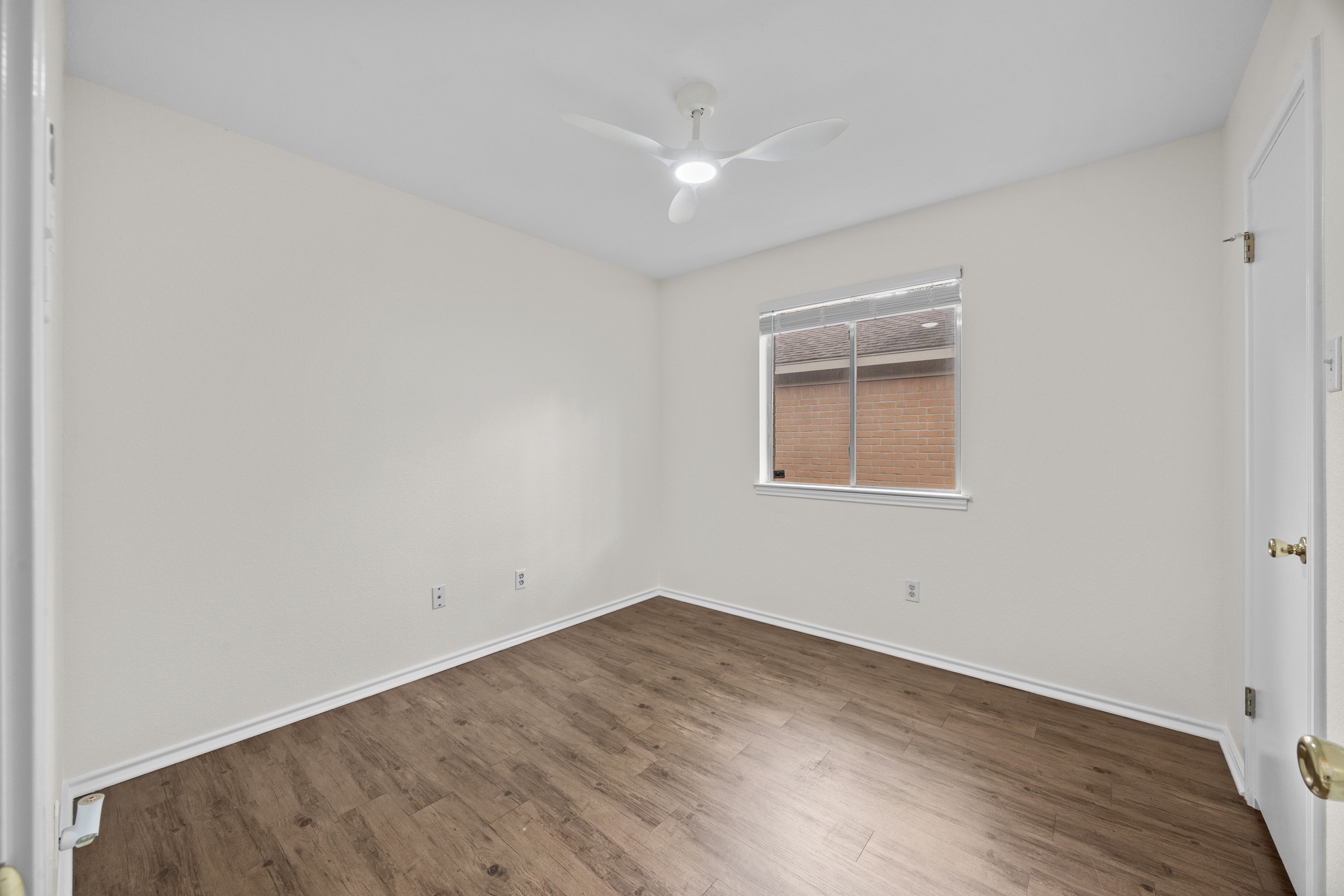 8219 Edgemoor Place Austin, TX 78749 - Photo 8 of 30 Newly installed window blinds & updated vinyl plank flooring.