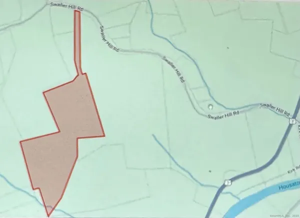 a view of staircase with white walls