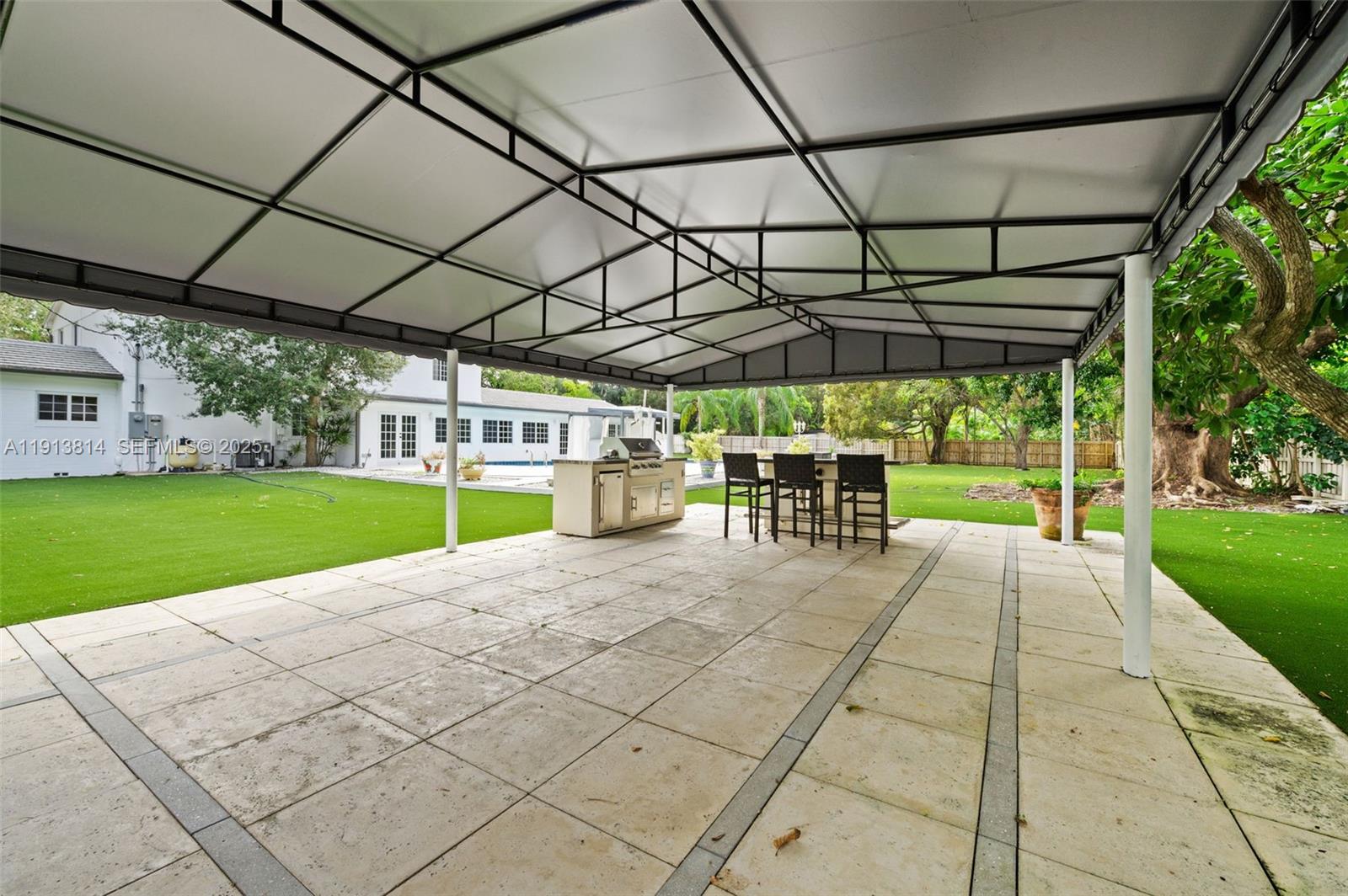 13000 Old Cutler Road Pinecrest, FL 33156 - Photo 36 of 45 a view of a backyard