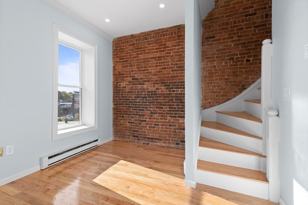 2 Woodbine Street, Unit 2 Boston, MA 02119 - Photo 6 of 26 a view of wooden door