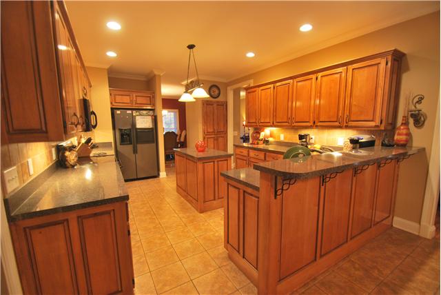 862 Coker Ford Road Portland, TN 37148 - Photo 3 of 20 Cook till your heart is content in your kitchen with custom cabinets and island