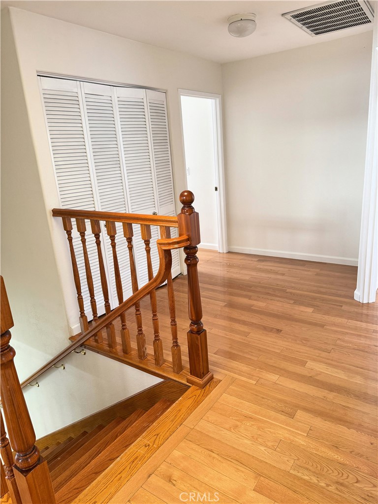 18319 Hart Street, Unit 3 Reseda, CA 91335 - Photo 14 of 18 a view of entryway with wooden floor