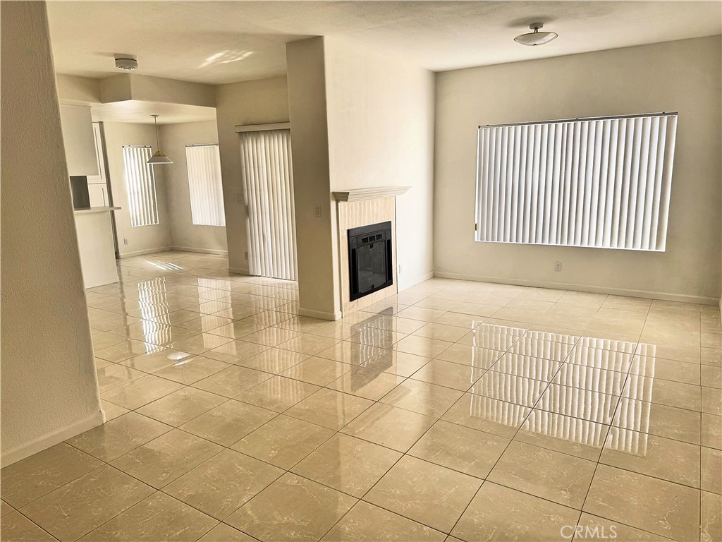 18319 Hart Street, Unit 3 Reseda, CA 91335 - Photo 2 of 18 a view of a livingroom with a fireplace