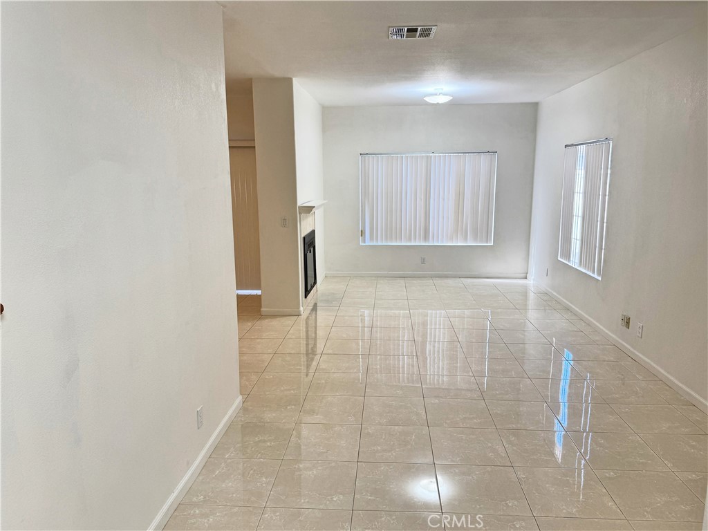 18319 Hart Street, Unit 3 Reseda, CA 91335 - Photo 4 of 18 a view of an empty room and window