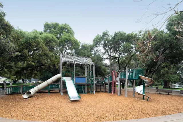 a view of a park with slide