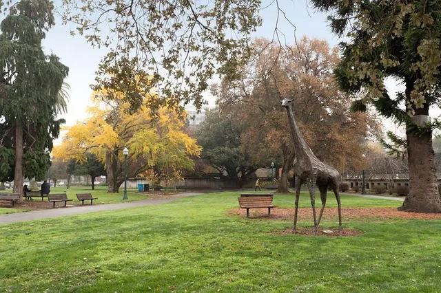 a view of a building with sitting area