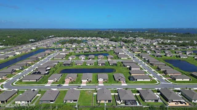 an aerial view of big building with a city view