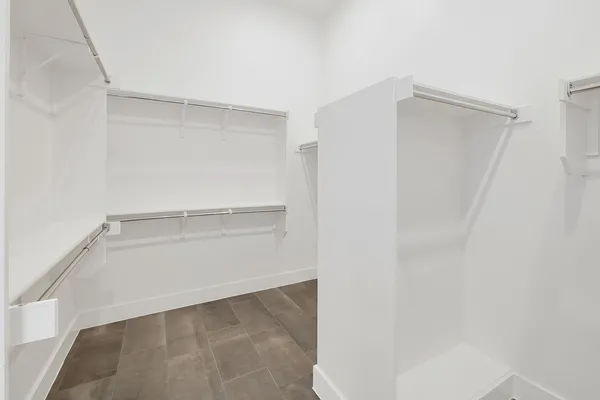 a view of an empty walk in closet