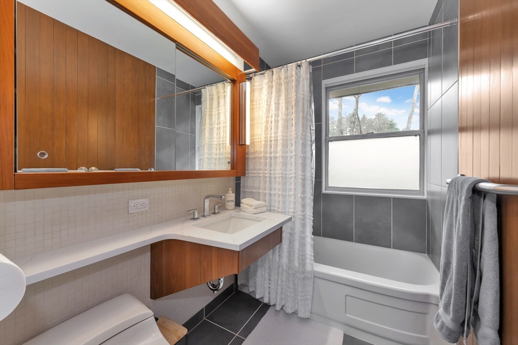 85 The Valley Road Concord, MA 01742 - Photo 22 of 38 a bathroom with a sink and a bathtub