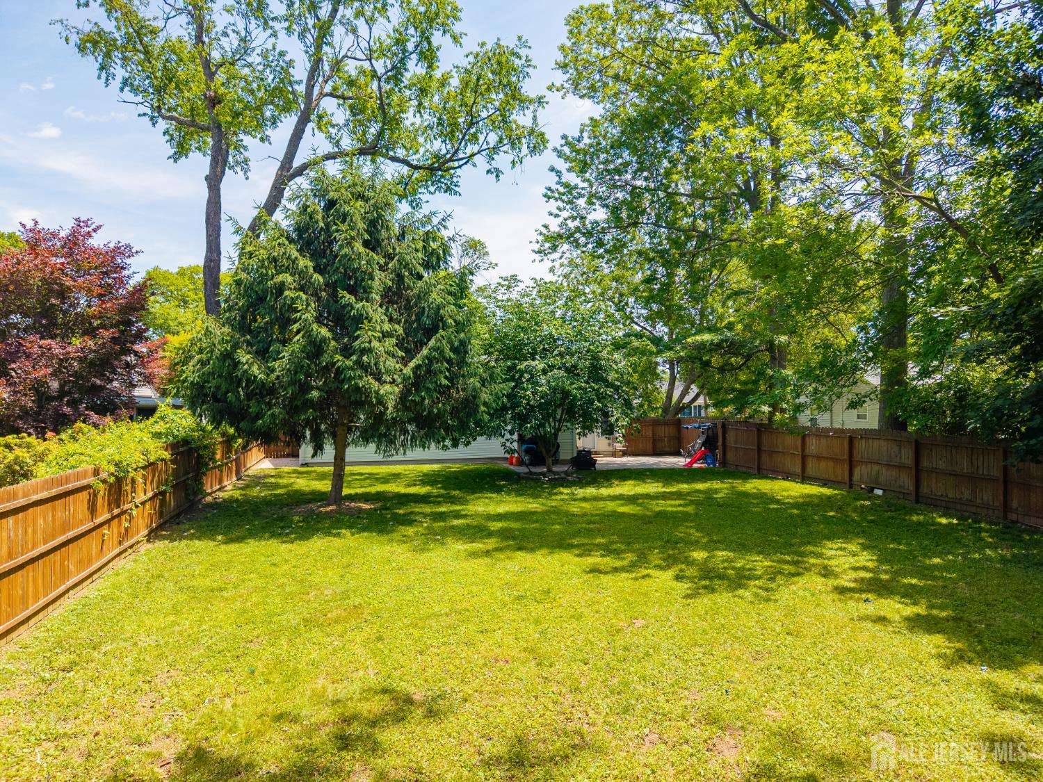 12 Pierrepont Avenue Middlesex, NJ 08846 - Photo 30 of 30 a view of a backyard with swimming pool