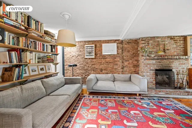 a bedroom with a bed potted plant with the outer view