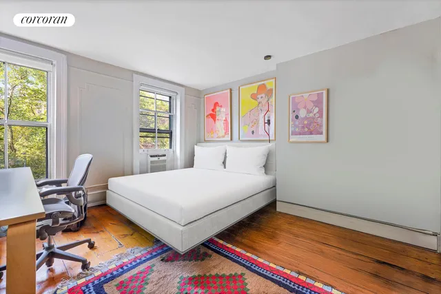 a view of a kitchen with furniture and a fireplace