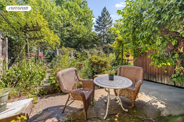 a bed room with a bed and a chair