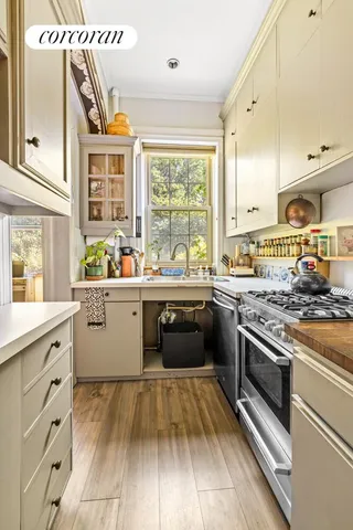 a room with cabinets and window