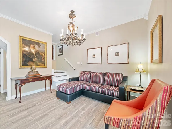a kitchen with stainless steel appliances granite countertop a stove and cabinets