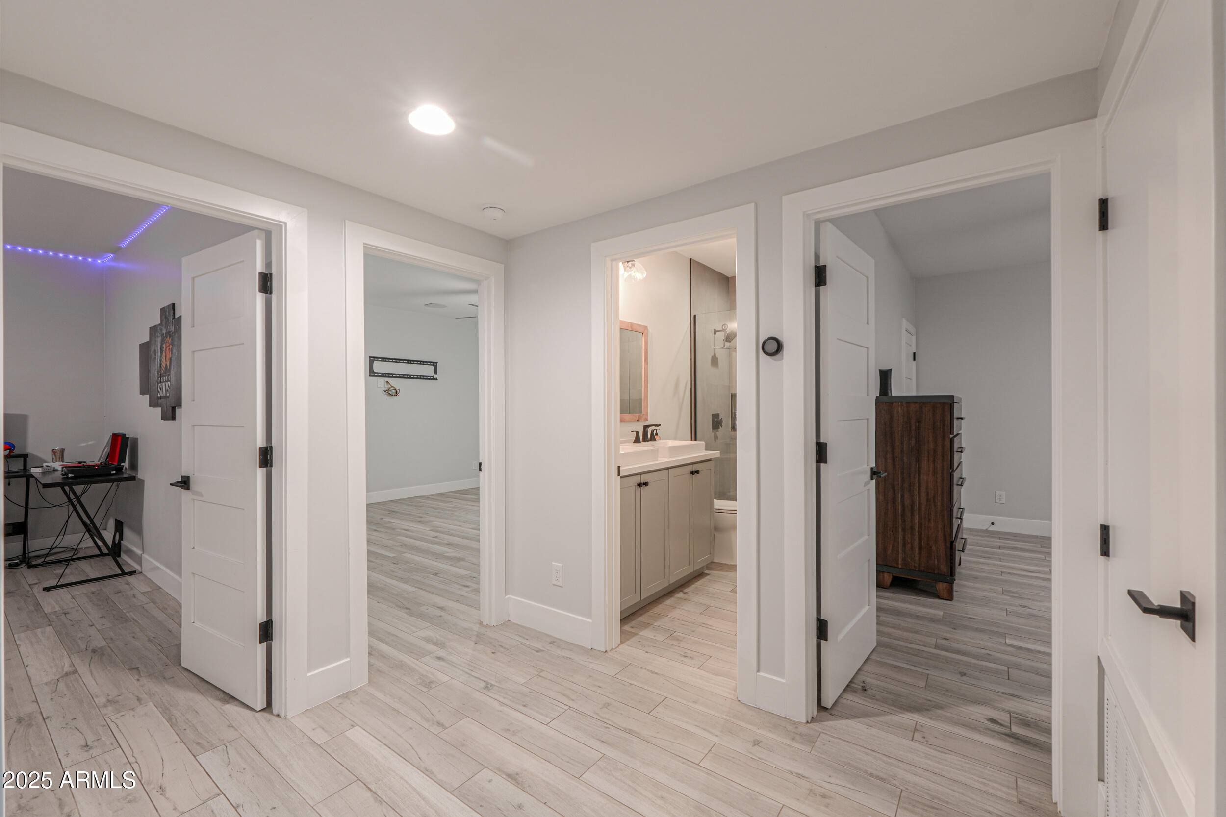 2529 West Magma Road San Tan Valley, AZ 85144 - Photo 41 of 93 a view of a hallway with wooden floor and closet area