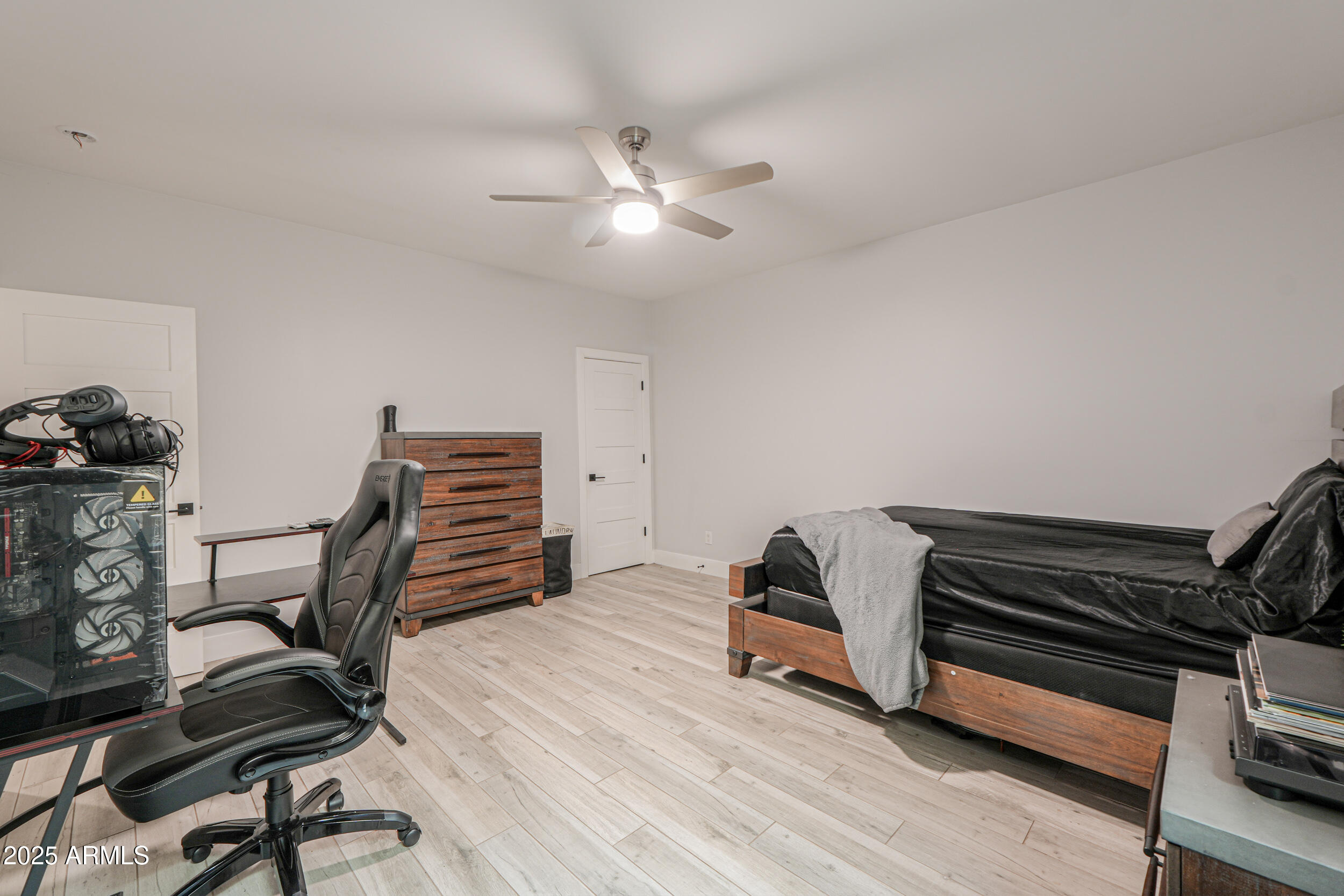 2529 West Magma Road San Tan Valley, AZ 85144 - Photo 42 of 93 a bedroom with furniture and a dresser