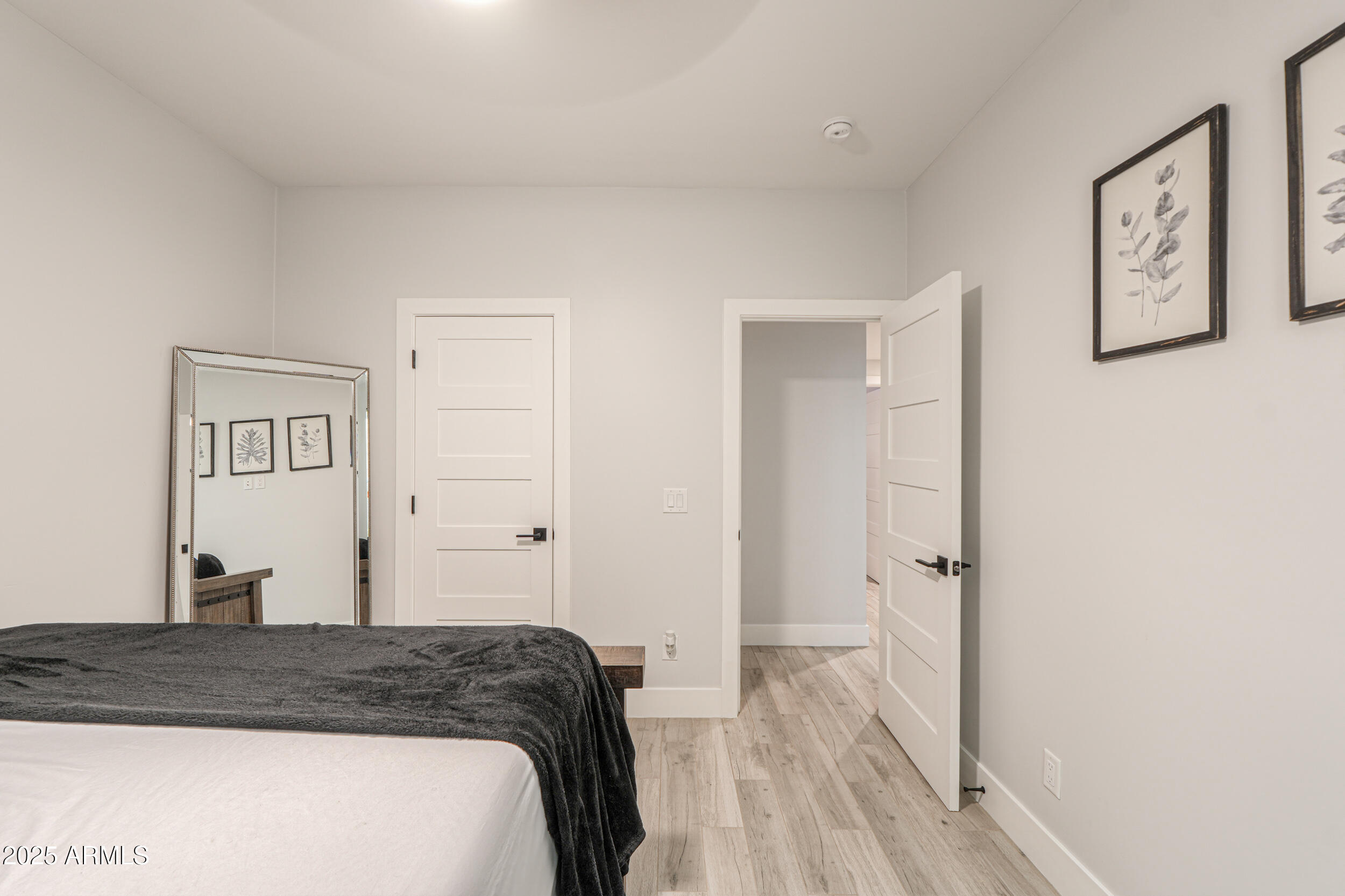 2529 West Magma Road San Tan Valley, AZ 85144 - Photo 50 of 93 a bedroom with a bed and hallway