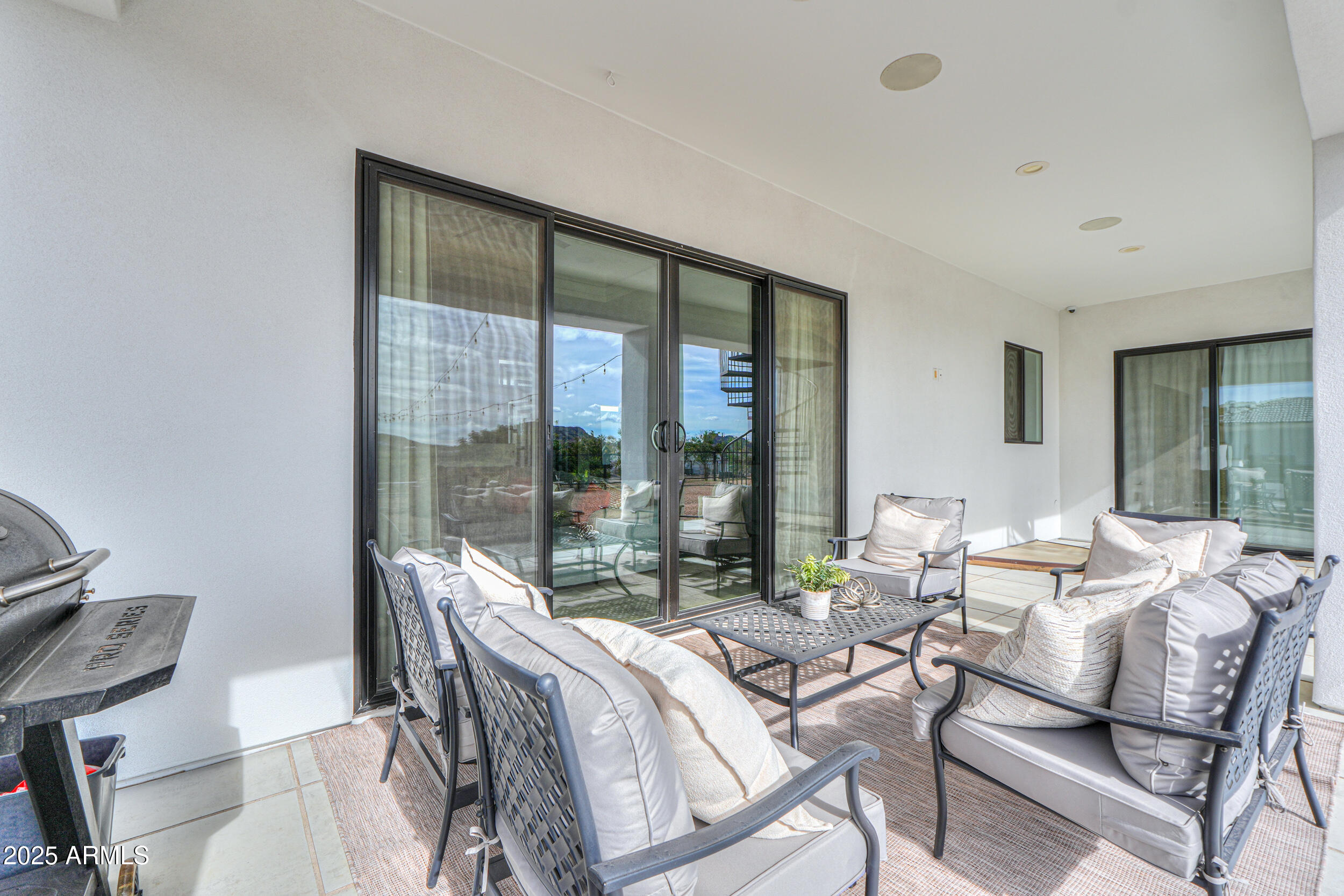 2529 West Magma Road San Tan Valley, AZ 85144 - Photo 56 of 93 a living room with furniture and a large window