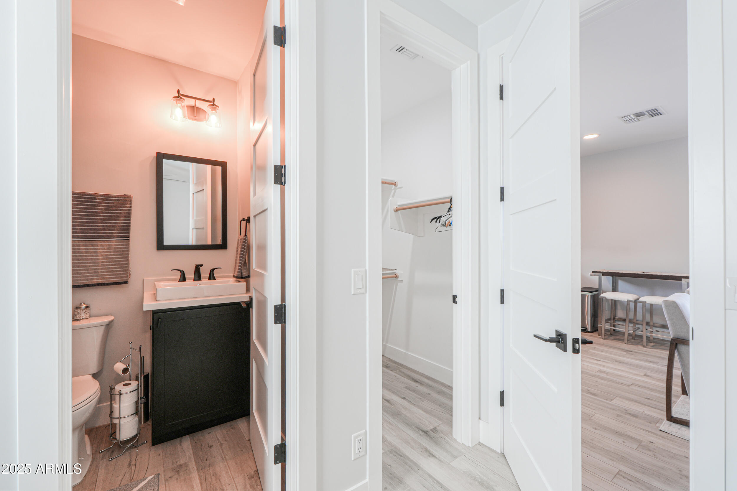 2529 West Magma Road San Tan Valley, AZ 85144 - Photo 74 of 93 a view of a bathroom from the hallway