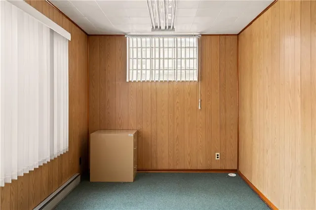 a view of an empty room and window