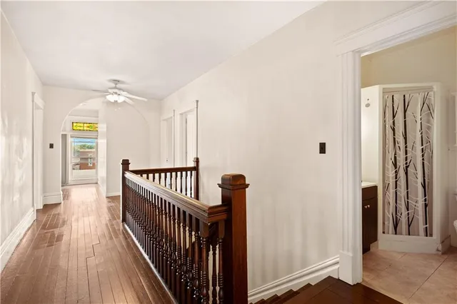 a bathroom with a sink a mirror and a shower
