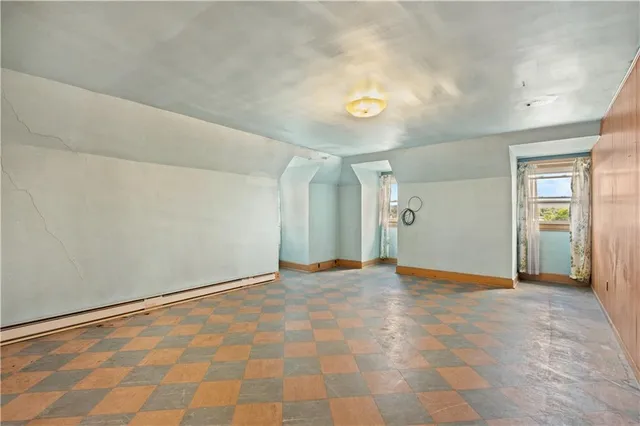 a view of a city street with houses