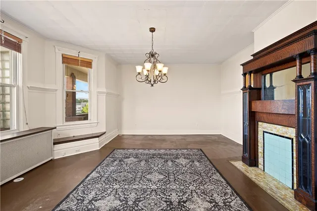 a view of a hallway with windows