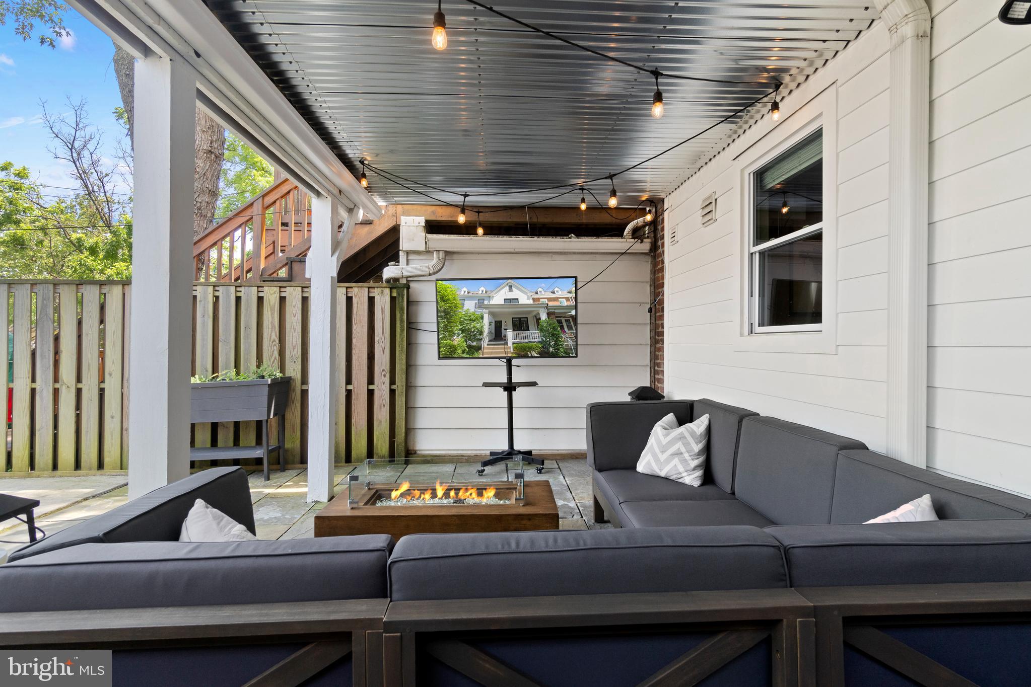 2225 39th Street Northwest Washington, DC 20007 - Photo 34 of 39 Covered flagstone patio