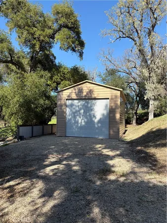 a view of a yard with tree s