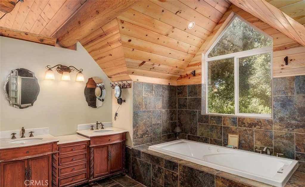 5935 Aluffo Road Paso Robles, CA 93446 - Photo 25 of 43 a bathroom with a sink and a mirror