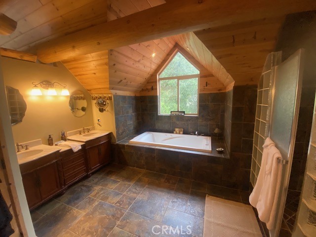 5935 Aluffo Road Paso Robles, CA 93446 - Photo 30 of 43 a bathroom with a tub sink and mirror