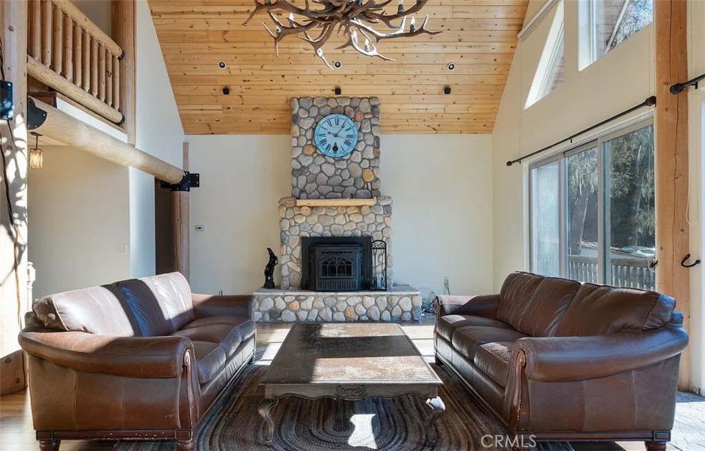 5935 Aluffo Road Paso Robles, CA 93446 - Photo 35 of 43 a living room with furniture and a fireplace