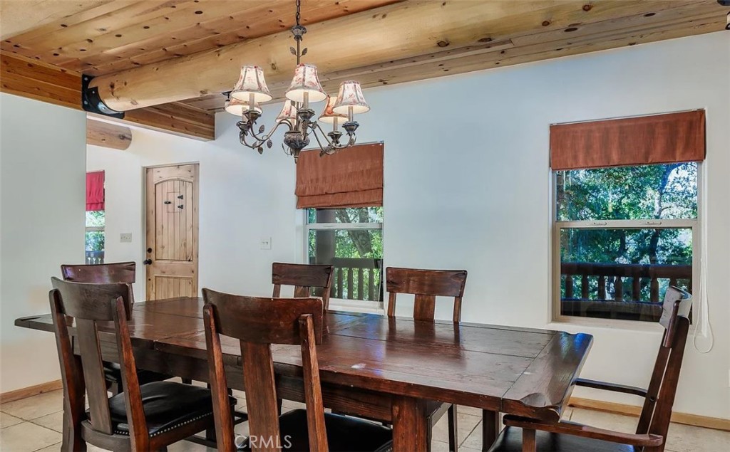 5935 Aluffo Road Paso Robles, CA 93446 - Photo 5 of 43 a view of a dining room with furniture window and outside view