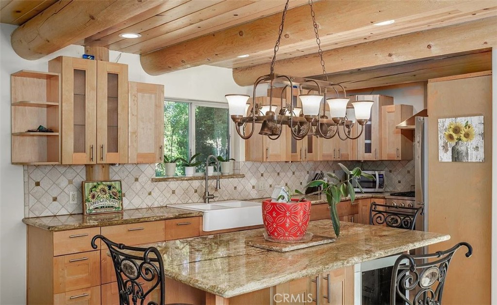 5935 Aluffo Road Paso Robles, CA 93446 - Photo 7 of 43 a kitchen with a stove a sink and a refrigerator