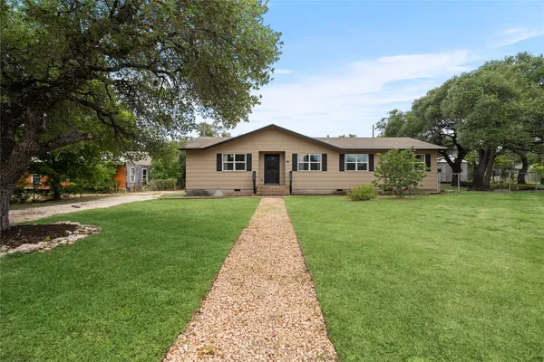 a front view of house with yard