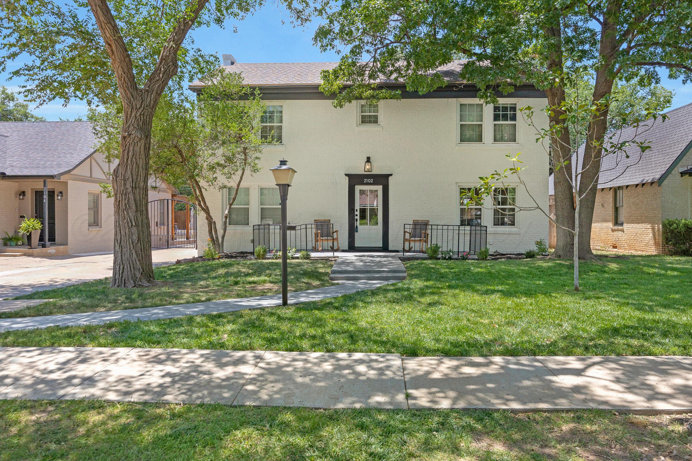 2102 South Hayden Street Amarillo, TX 79109 - Photo 1 of 44 a view of a house with a yard