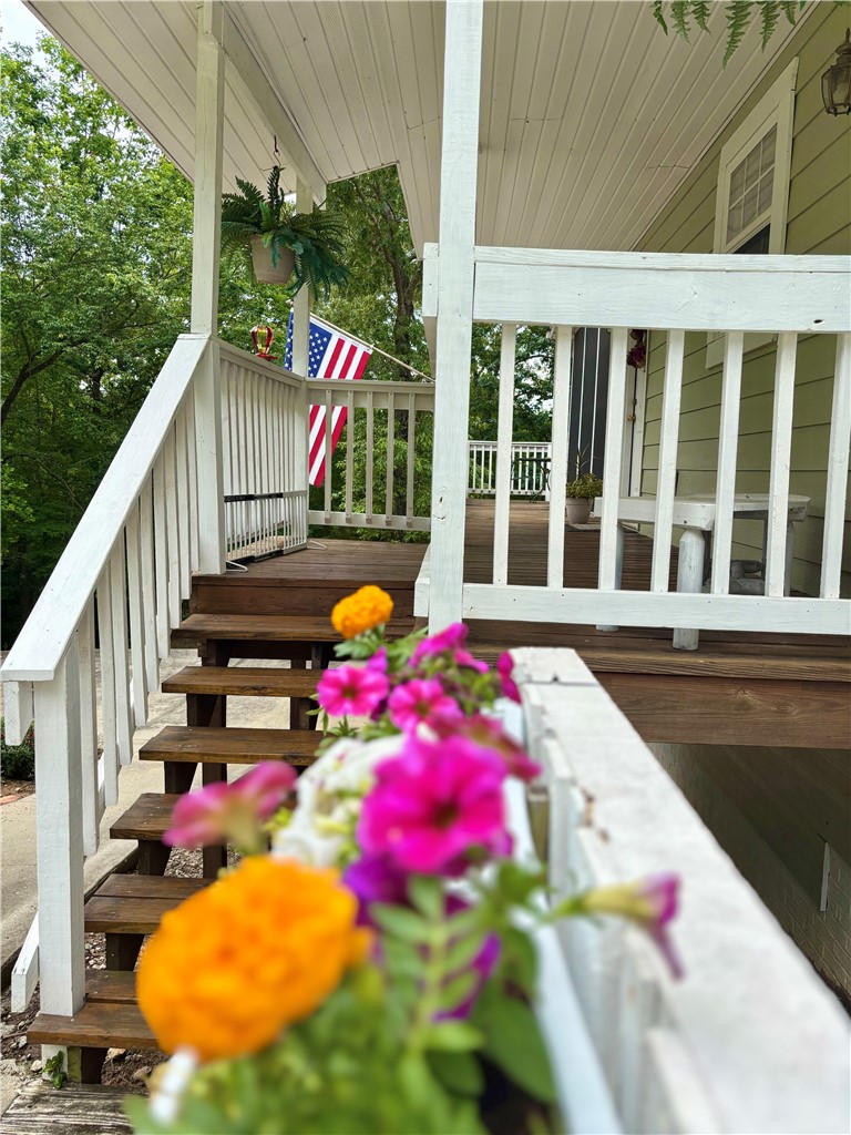 608 McKinney Way Westminster, SC 29693 - Photo 2 of 34 An inviting front porch with sturdy wooden steps, perfect for enjoying peaceful outdoor moments.