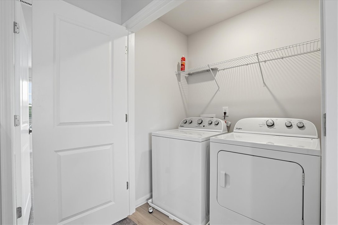 365 Sliding Rock Drive Pendleton, SC 29670 - Photo 25 of 46 Functional laundry space featuring a practical wire shelving unit for storage.