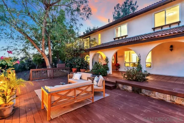 a outdoor living space with furniture and garden view