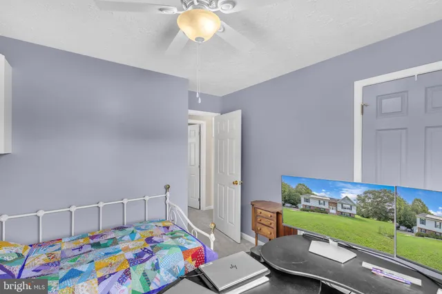 a kids room with a bed and toys