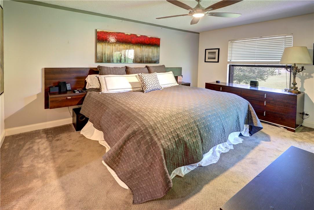 3130 Millwood Terrace, Unit M210 Boca Raton, FL 33431 - Photo 13 of 23 a bed room with a bed and a view