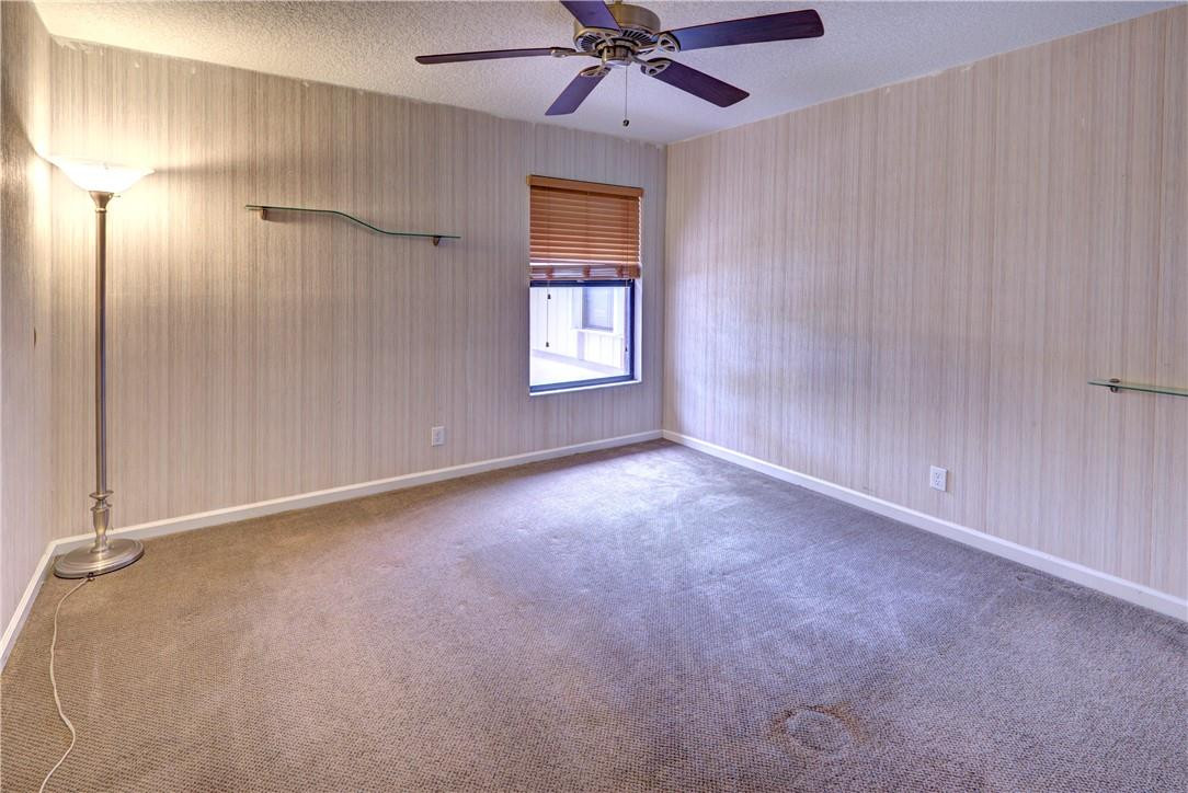 3130 Millwood Terrace, Unit M210 Boca Raton, FL 33431 - Photo 20 of 23 a view of an empty room with a window