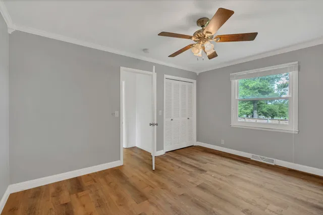 a view of a bathroom with mirror