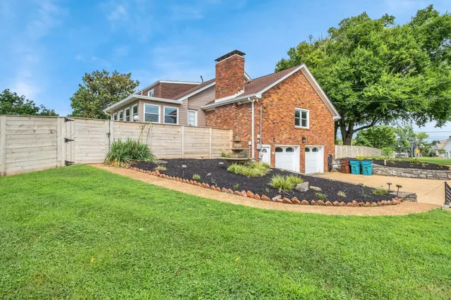 a view of a backyard with a garden
