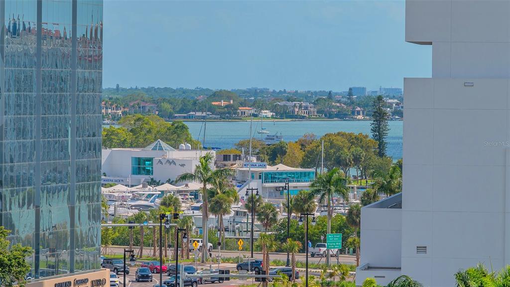 301 Quay Commons, Unit 606 Sarasota, FL 34236 - Photo 25 of 36 a view of a city with tall buildings