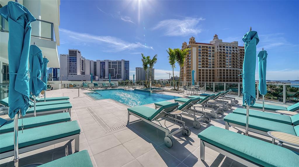 301 Quay Commons, Unit 606 Sarasota, FL 34236 - Photo 28 of 36 a view of a city with tall buildings