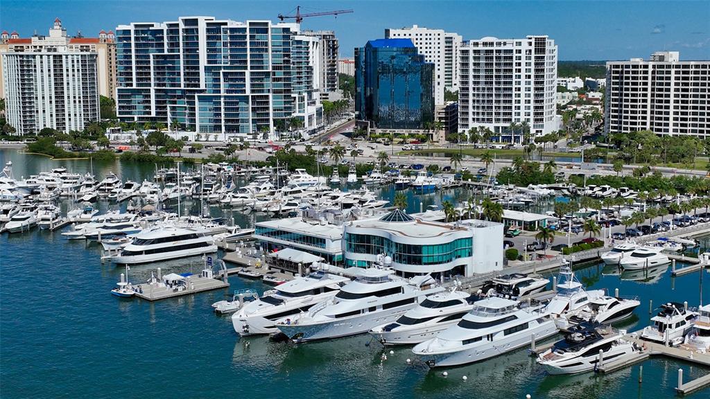 301 Quay Commons, Unit 606 Sarasota, FL 34236 - Photo 31 of 36 a picture of a city with tall buildings
