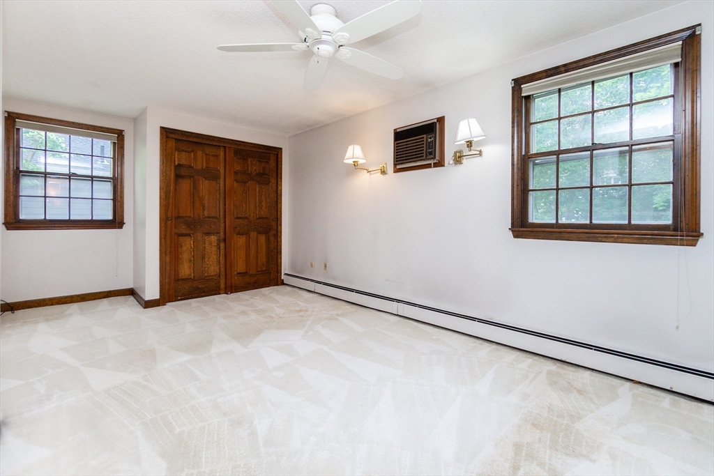 33 Sherwood Road Swampscott, MA 01907 - Photo 19 of 28 an empty room with windows and closet